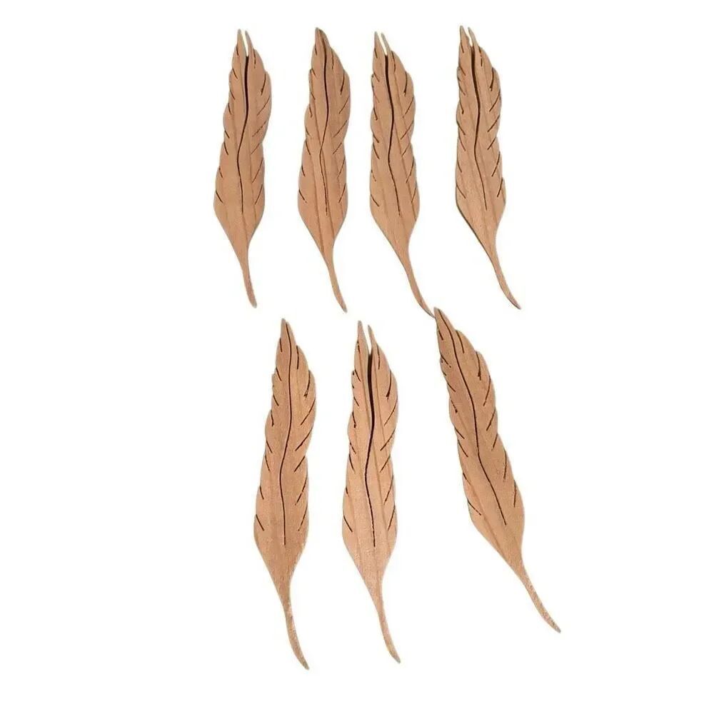 7 Hand Carved 4 1/2” Wooden Feathers